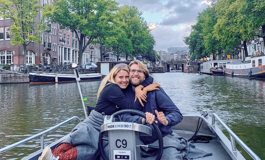 A truly happy place: people happily embracing each other during a canal cruise